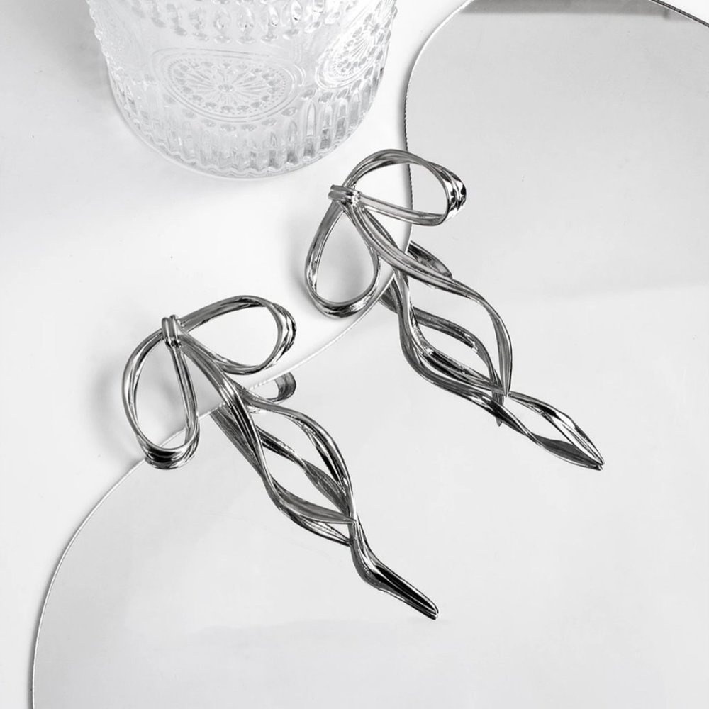 Anthro Silver Bow Earring - Picture 3 of 9